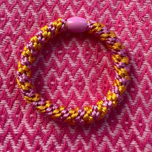 1749 Kknekki Haargummi gelb rosa